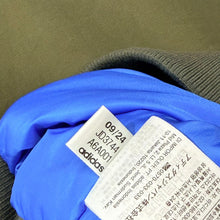 Lade das Bild in den Galerie-Viewer, adidas アディダス 24AW NEW PAD JKT OLISTR BROYA 中綿ボンバージャケット JD3744 S カーキ 15572